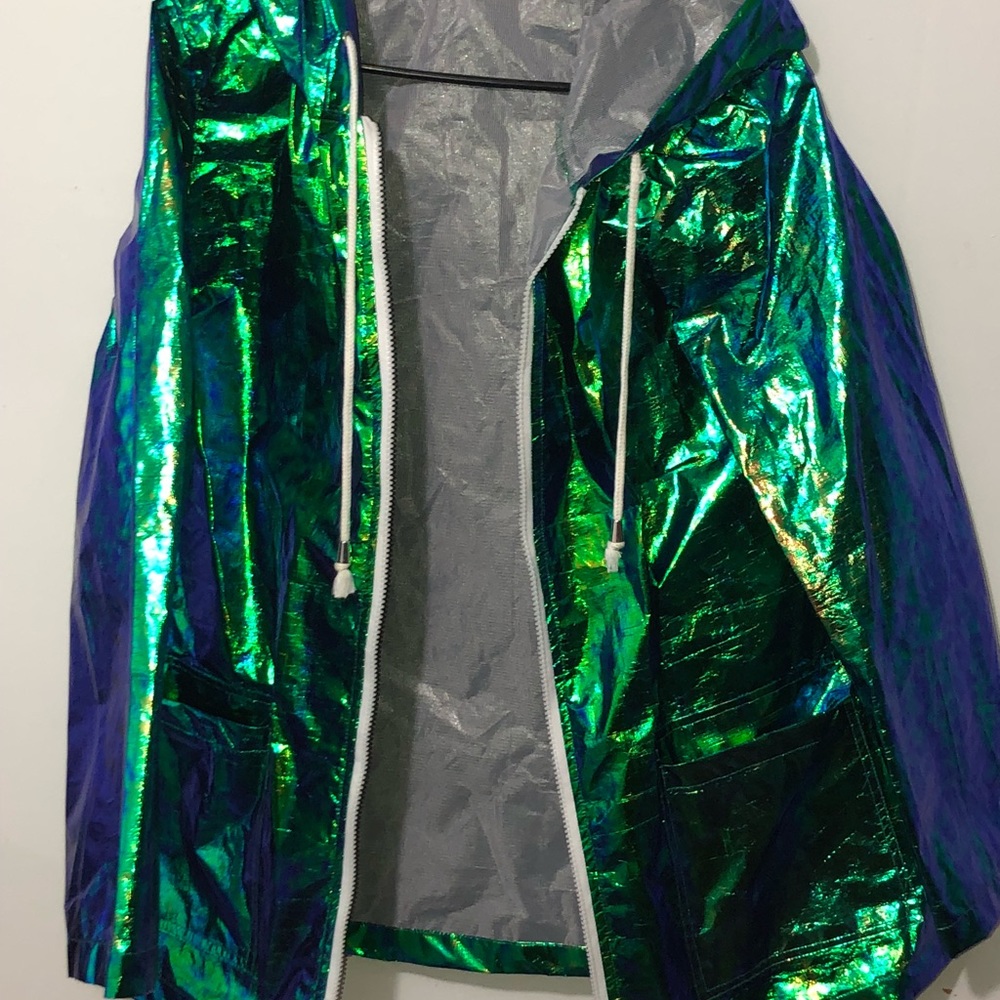 green/bluish holographic rain coat